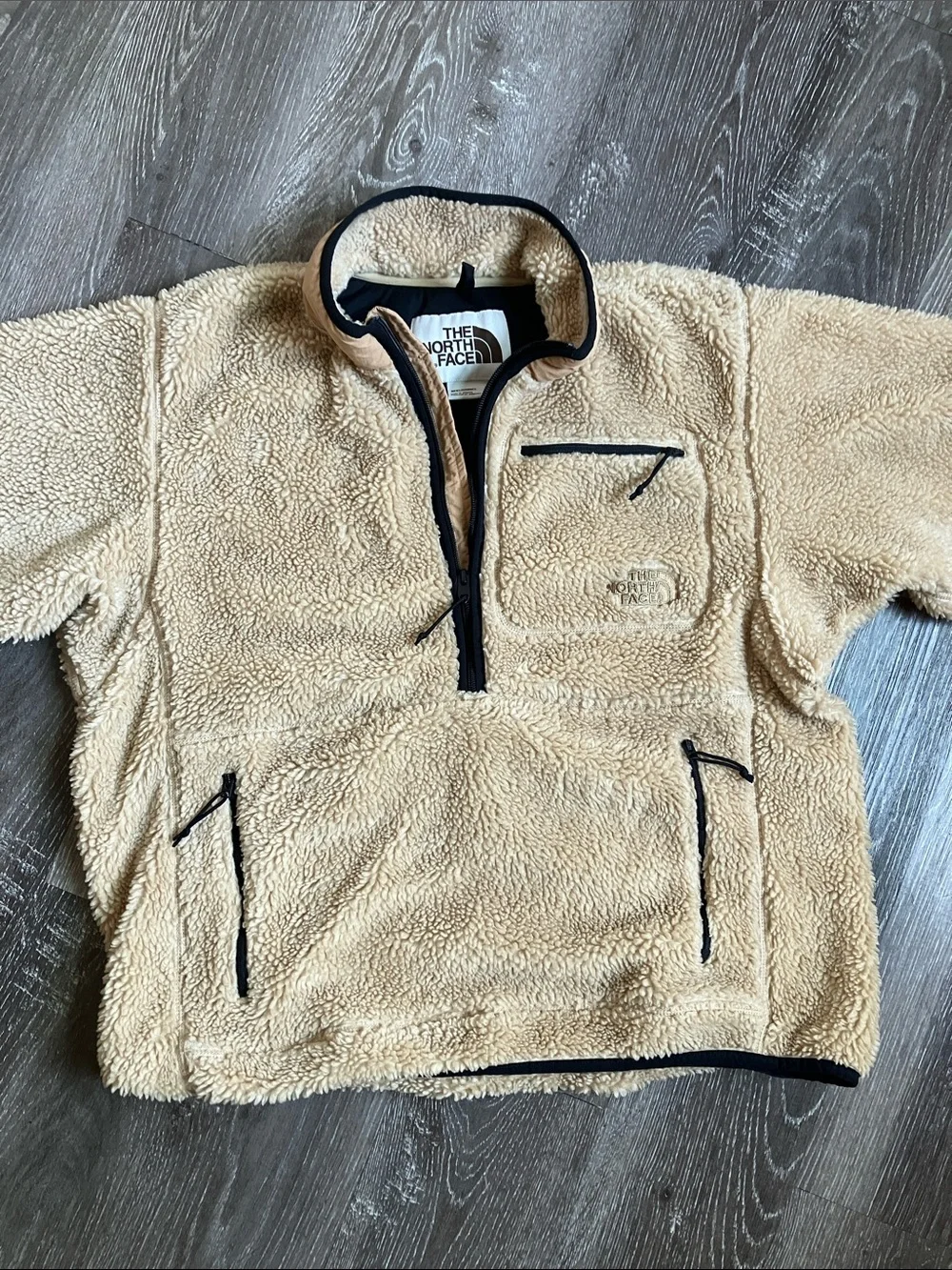 The North Face Extreme Pile Pullover in an almond butter/tan colorway